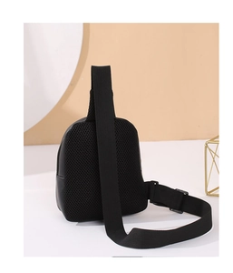 Black quilted chest bag featuring breathable mesh back and adjustable nylon strap