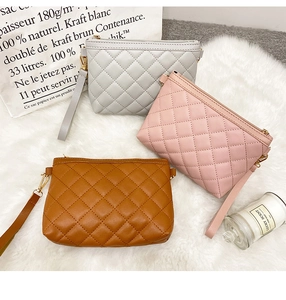 Three quilted PU leather mini bags in grey, pink and brown with gold hardware details