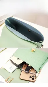Internal view showing light green croc-effect bag capacity for phone and cosmetics