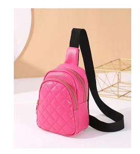 Chic pink quilted diamond pattern chest bag with golden zippers and adjustable strap