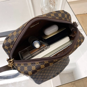 Retro brown printed crossbody camera bag with spacious interior for daily essentials