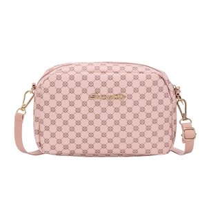 Pink crossbody camera bag for women with clover texture and adjustable strap