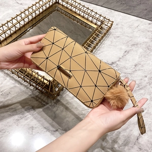Khaki geometric patchwork long wallet for women with zipper closure and fur pompom charm
