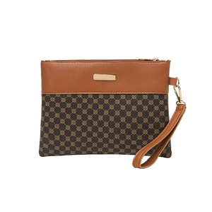 Retro printed women's clutch bag with brown leather patchwork and gold wristlet strap