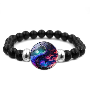 Yin Yang Tai Chi beaded bracelet with black onyx-style beads and dreamy cloud pendant