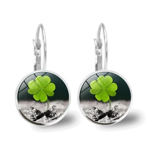 Leverback earrings with crystal four-leaf clover gem pendants in a silver-tone finish