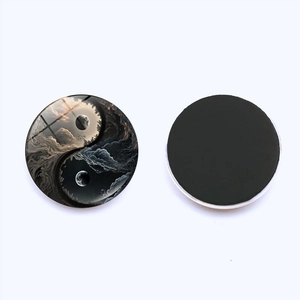 Macro detail of Yin Yang crystal glass fridge magnets showing both artistic and magnetic sides