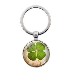 Silver four-leaf clover keychain with vintage floral glass cabochon pendant charm