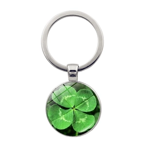 Silver four-leaf clover keychain with green glass pendant charm for luck and fortune