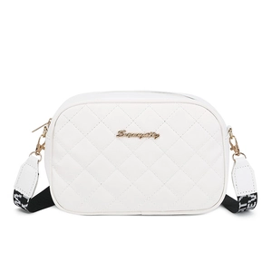 White quilted camera bag with gold logo and wide jacquard woven strap for women