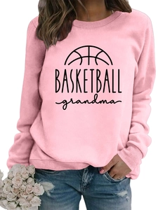 Detail of pink crewneck sweatshirt with black Basketball Grandma print and soft fabric