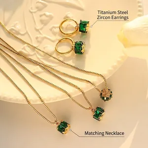 Gold titanium steel jewelry set with emerald green zircon necklace and earrings