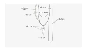Dimensions du collier coeur asymétrique en perles d'eau douce avec chaîne à pampilles