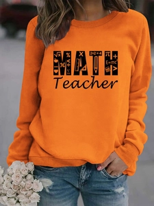 Close-up of bright orange Math Teacher sweatshirt with creative educational graphic print