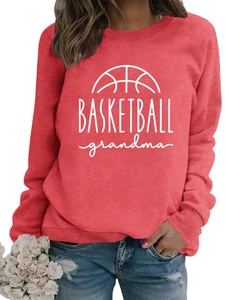 Close-up of red crewneck sweatshirt featuring white basketball grandma graphic and rib cuffs