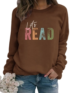 Detail of Let's READ vintage print on loose brown long sleeve sweatshirt with ribbed cuffs