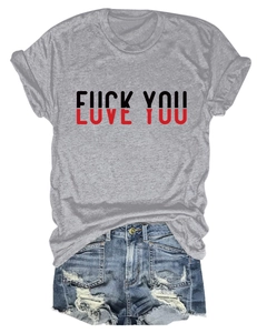 Detail of grey Love You printed T-shirt paired with frayed denim shorts on white background