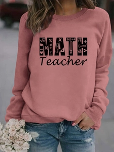 Detail of pink Math Teacher sweatshirt showing ribbed cuffs and mathematical symbols print