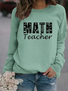Detail of mint green Math Teacher sweatshirt featuring ribbed crewneck and formula graphics