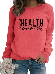 Detail of Mental HEALTH matters print on coral pink crewneck sweatshirt with ribbed cuffs