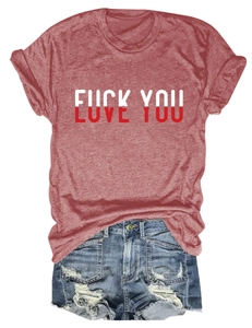 Flat lay of maroon cotton t-shirt with 'Love You' graphic and ripped denim shorts