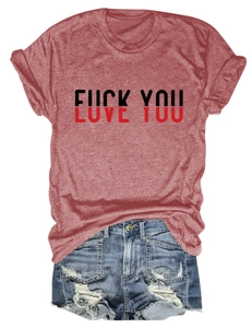 Detail of casual t-shirt with love you print and distressed denim shorts flat lay