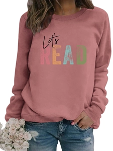 Detail of Let's Read print on dusty rose sweatshirt with ribbed round neck design