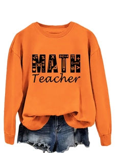 Detail of orange math teacher sweatshirt with math formulas and ribbed round neckline