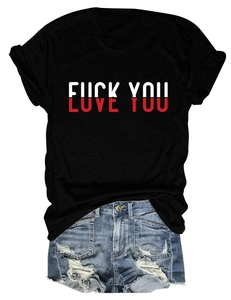 Detail of black cotton T-shirt with Love You print and distressed denim shorts set