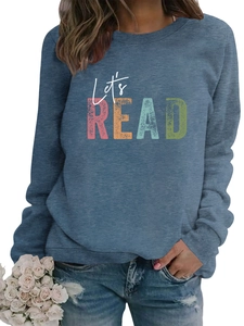 Detail of Let's READ print on a blue long sleeve crewneck sweatshirt for women