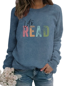 Detail of Let's READ colorful textured lettering on a navy blue long-sleeved sweatshirt