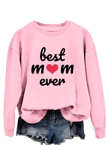 Detail of pink 'Best Mom Ever' sweatshirt paired with distressed denim shorts