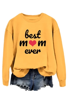 Detail of Best Mom Ever logo print on yellow crewneck sweatshirt with red heart