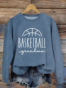 Detail of BASKETBALL grandma screen print on a denim blue crewneck cotton sweatshirt