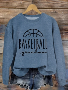 Detailed view of blue crewneck sweatshirt with black Basketball Grandma graphic print