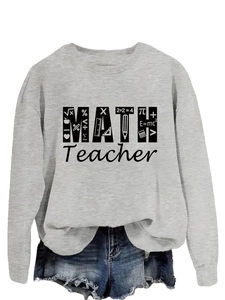 Detail of grey Math Teacher sweatshirt with printed formulas and mathematical icons