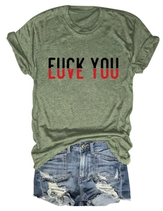 Flat lay of casual grey-green T-shirt with Love You print and distressed denim shorts