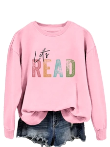 Detail view of light pink sweatshirt with 'Let's READ' graphic print and ribbed collar