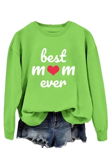 Close-up of Best Mom Ever print on green crewneck sweatshirt with red heart detail