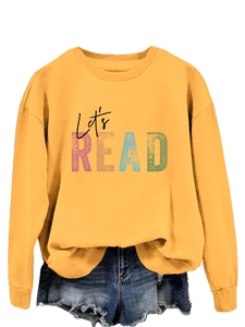 Detail of Let's Read colorful letter print on yellow long sleeve sweatshirt
