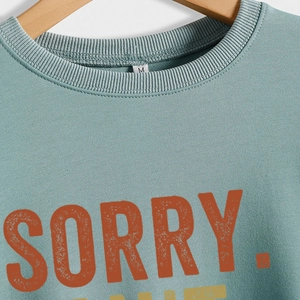 Sweatshirt femme vert sauge à col rond avec impression SORRY de style vintage