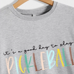 Grey long sleeve sweatshirt with 'It's a good day to play Pickleball' colorful print