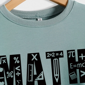 Math teacher sweatshirt in light green featuring equations and a ribbed crew neck