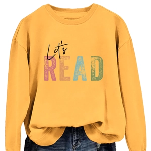 Mustard yellow sweatshirt featuring Let's READ vintage print and ribbed crew neck design