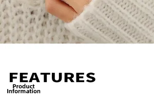 Gros plan des poignets côtelés du pull en mohair blanc montrant une texture moelleuse