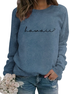 Detail of the soft knit fabric and Hawaii heart print on a long-sleeve blue sweatshirt