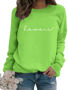 Detail of Hawaii heart print on bright green crewneck sweatshirt with ribbed cuffs