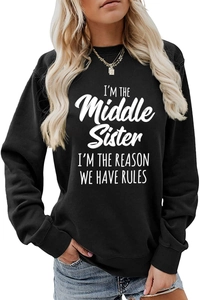 Detail view of I'm the Middle Sister slogan print on a black long sleeve sweatshirt