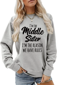 Detail of grey sweatshirt with black I'M THE MIDDLE SISTER humorous printed slogan