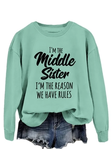 Sage green sweatshirt with 'I'M THE Middle Sister' text print and denim shorts